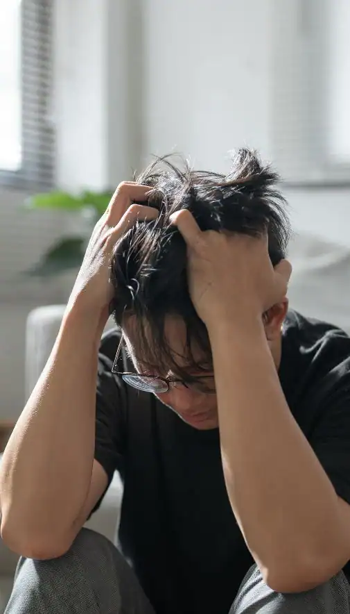 Image of upset man because of erectile dysfunction symptoms Exeter