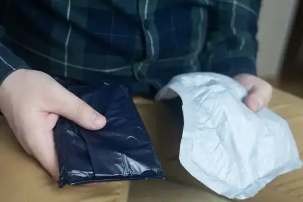 image of man holding stool incontinence Exeter products